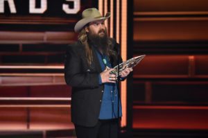 NASHVILLE, TN - NOVEMBER 08: Chris Stapleton accepts an award onstage at the 51st annual CMA Awards at the Bridgestone Arena on November 8, 2017 in Nashville, Tennessee.