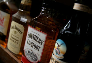 SAN ANSELMO, CA - JANUARY 14: A bottle of Southern Comfort whiskey is displayed on a shelf at a liquor store on January 14, 2016 in San Anselmo, California. Brown-Forman Corp. announced plans to sell its iconic brand Southern Comfort whiskey to Louisiana-based Sazerac for $543.5 million.