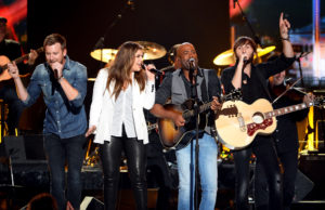 LAS VEGAS, NV - APRIL 06: Recording artists Charles Kelley (L), Hillary Scott (2nd L) and Dave Haywood (R) of Lady Antebellum perform onstage with recording artist Darius Rucker (2nd R) duringg the 49th Annual Academy of Country Music Awards at the MGM Grand Garden Arena on April 6, 2014 in Las Vegas, Nevada.
