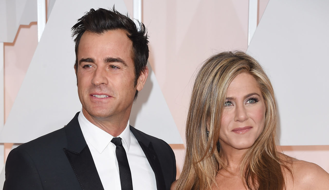 HOLLYWOOD, CA - FEBRUARY 22: Actors Justin Theroux (L) and Jennifer Aniston attend the 87th Annual Academy Awards at Hollywood & Highland Center on February 22, 2015 in Hollywood, California.