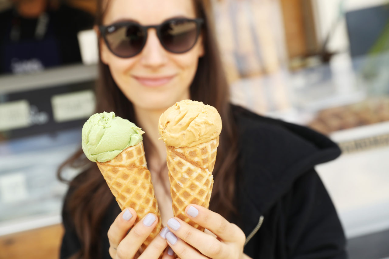 Woman holding ice cream cones