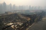 PARADISE, CA - NOVEMBER 15: An aerial view of a shopping center destroyed by the Camp Fire on November 15, 2018 in Paradise, California. Fueled by high winds and low humidity the Camp Fire ripped through the town of Paradise charring over 140,000 acres, killing at least 56 people and destroying over 8,500 homes and businesses. The fire is currently at 40 percent containment. (Photo by Justin Sullivan/Getty Images)