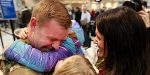 SALT LAKE CITY, UT - DECEMBER 14: Staff Sergeant Hyrum Durffy of the Utah National Guard is greeted by his family as he returns home for the holidays at the Salt Lake City International Airport on December 14, 2015 in Salt Lake City, Utah. They are part of the Utah National Guard's 141st Military Intelligence Battalion who is returning form Afghanistan where they have been deployed since last February. (Photo by George Frey/Getty Images