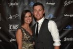 NASHVILLE, TN - NOVEMBER 01: Gabi Dugal and Scotty McCreery attend the Folds of Honor/CMS Nashville Songwriter of the Year Party during the 50th annual CMA Awards week on November 1, 2016 in Nashville, Tennessee. (Photo by Rick Diamond/Getty Images for CMS)