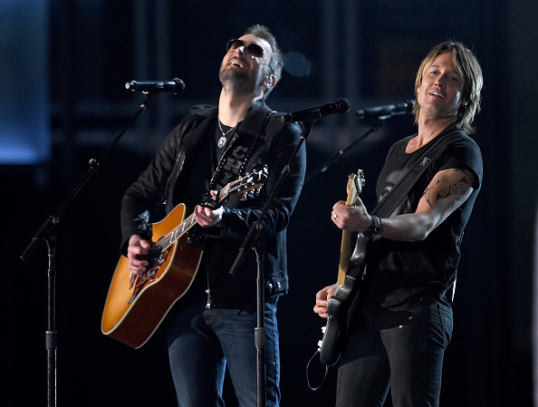 ARLINGTON, TX - APRIL 19:  Singer/songwriters Eric Church (L) and Keith Urban perform during the 50...