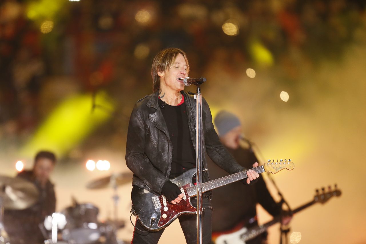 CALGARY, AB - NOVEMBER 24: Recording artist Keith Urban during the Grey Cup halftime show at McMaho...