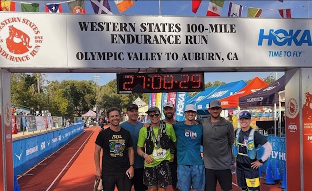 John Almeda (in green shirt) and his team at the finish of the Western States 100 (Photo: Vanessa B...